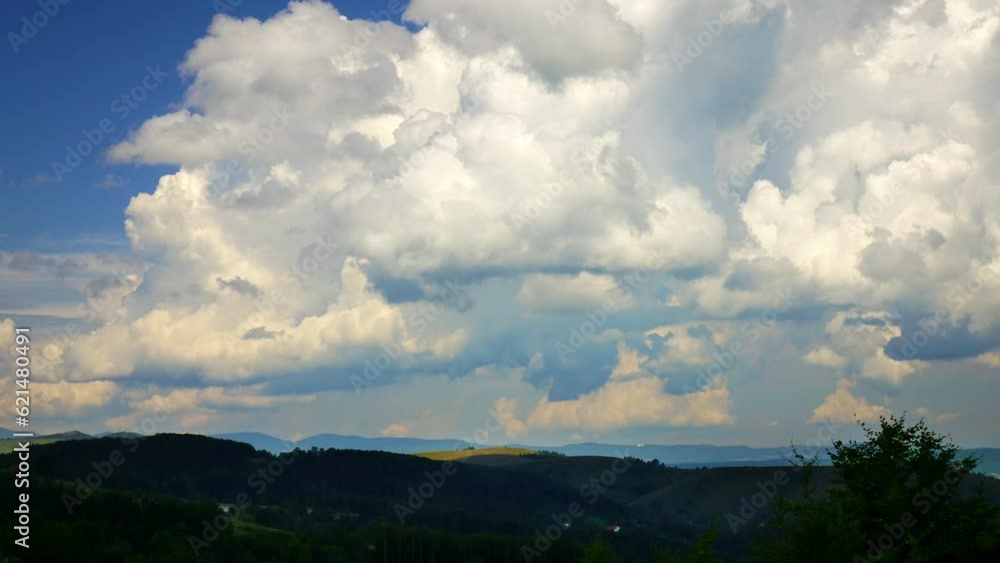 Nature landscape cumulus clouds rolling over hills and mountains time-lapse Nature landscape cumulus clouds rolling over hills and mountains time-lapse