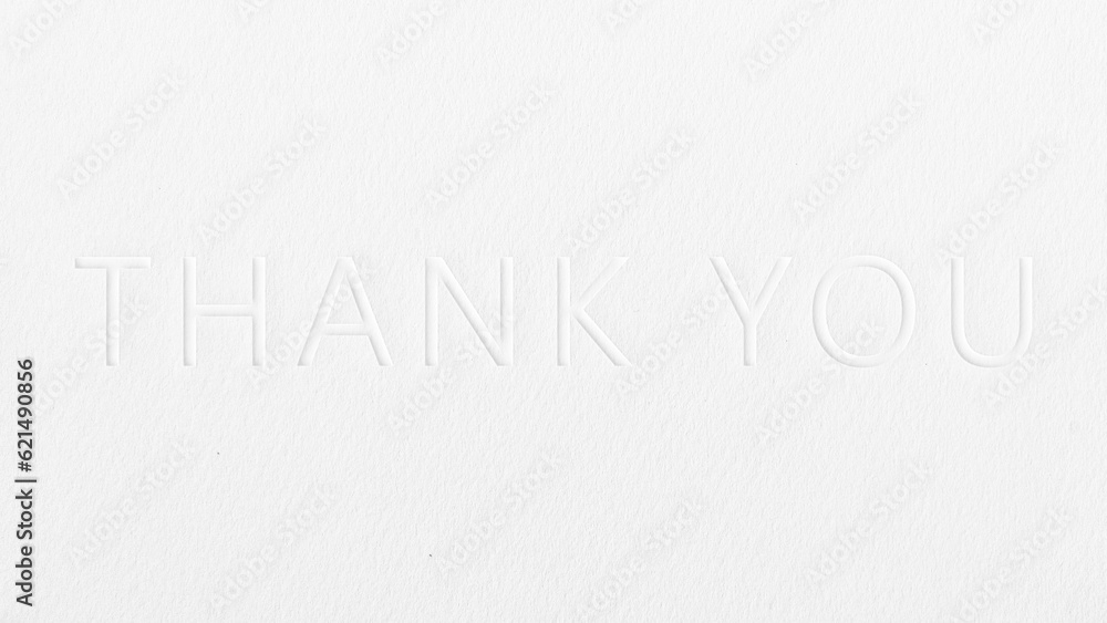 Embossed thank you card on white paper background Embossed thank you card on white paper background