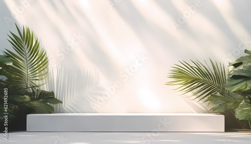 Minimalist, clean, and modern looks white podium for product display backdrop with palm tree, sunlight, and shadow plant shadow.