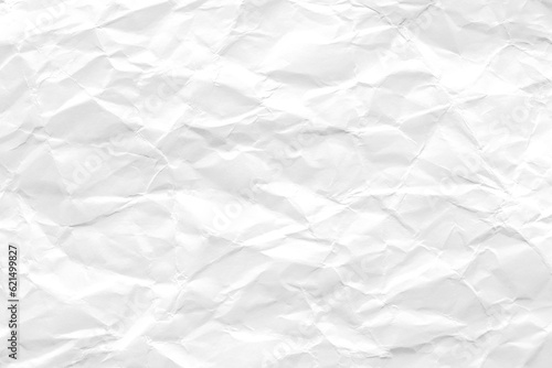Crumpled white paper texture background. Wrinkled paper surface abstract background. 