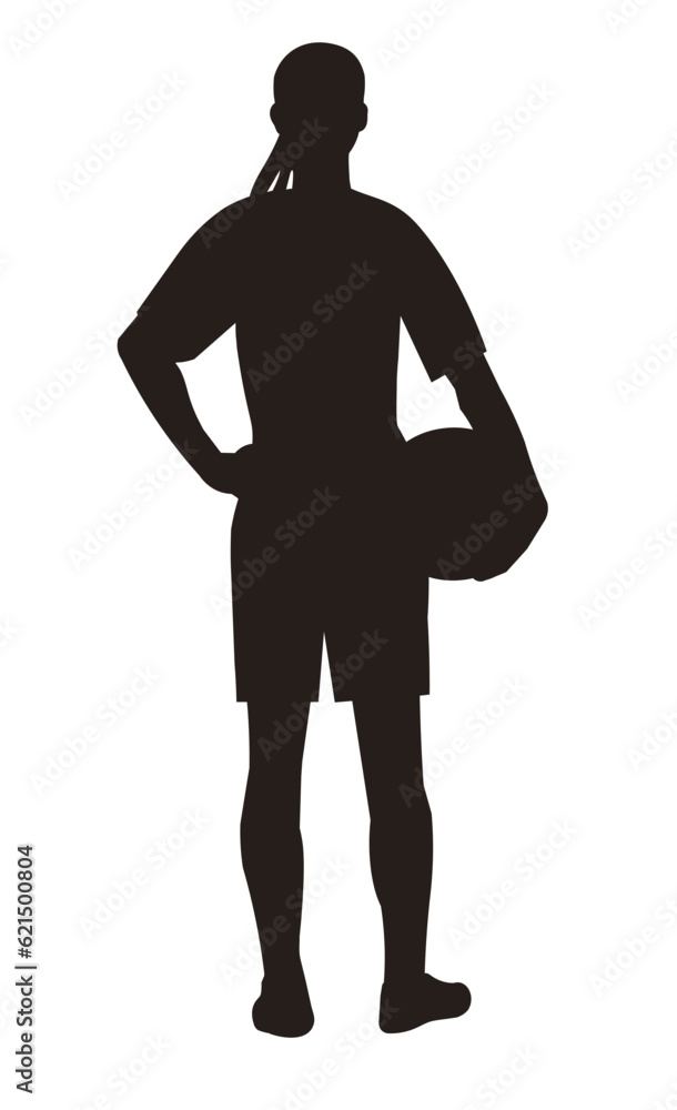 Girl silhouette of a women's football player standing from the back holding a ball in her hand