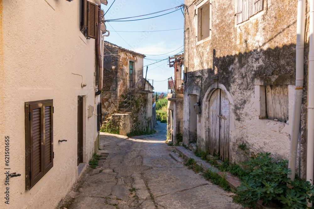 Obraz premium Picturesque street in Valaneio village, Corfu, Greece