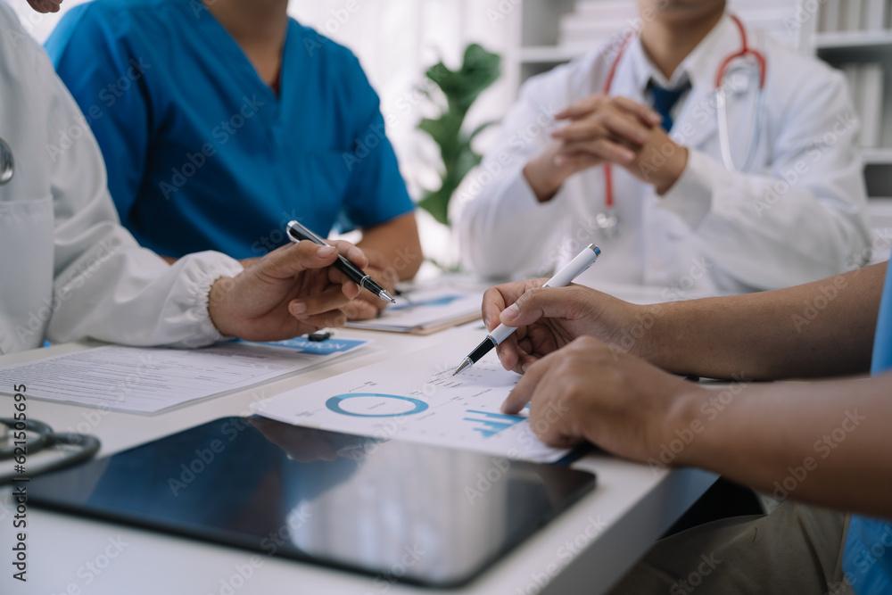 Doctor working in hospital use calculator, Healthcare and medical concept. Doctor working in hospital use calculator, Healthcare and medical concept.