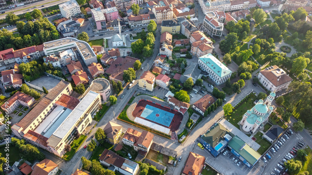 Naklejka premium Tuzla, Bosnia and Herzegovina, aerial drone view. Buildings, streets and residential houses. Tuzla is a town and municipality in north BiH, Europe.