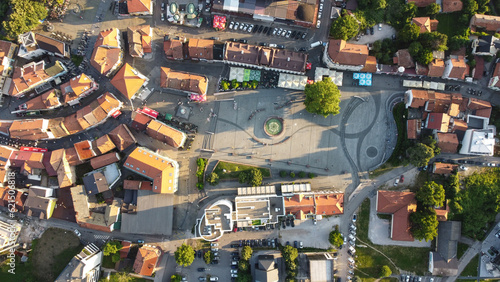 Aerial drone view of city of Tuzla, Bosnia and Herzegovina. Main square in city centre. Buildings, streets and residential houses. Tuzla is a town and municipality in north BiH, Europe.