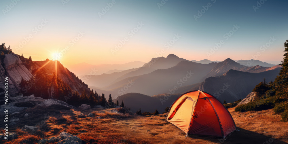 Camping tent high in the mountains at sunset. Banner with copy space