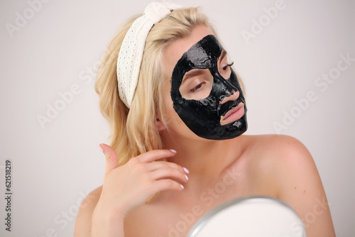 woman doing morning skin care after shower.