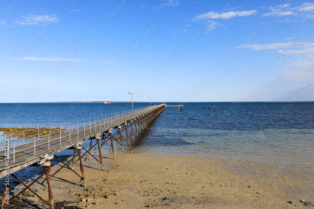 View of Ceduna jetty against blue sky and ocean View of Ceduna jetty against blue sky and ocean