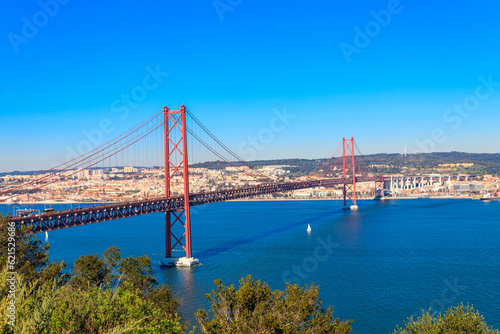 The 25th April Bridge (Ponte 25 de Abril) is a suspension bridge road-rail over the Tagus river that connects the city of Lisbon to the city of Almada. View from Almada.