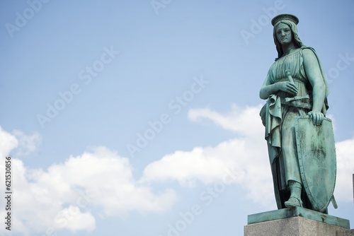 Bronze statue at the foot of the Concordia Column in Stuttgart - allegory of the military