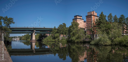 Photography Twin towers at the bridge St Eriksbron at the canal Karlbergskanalen, a sunny su