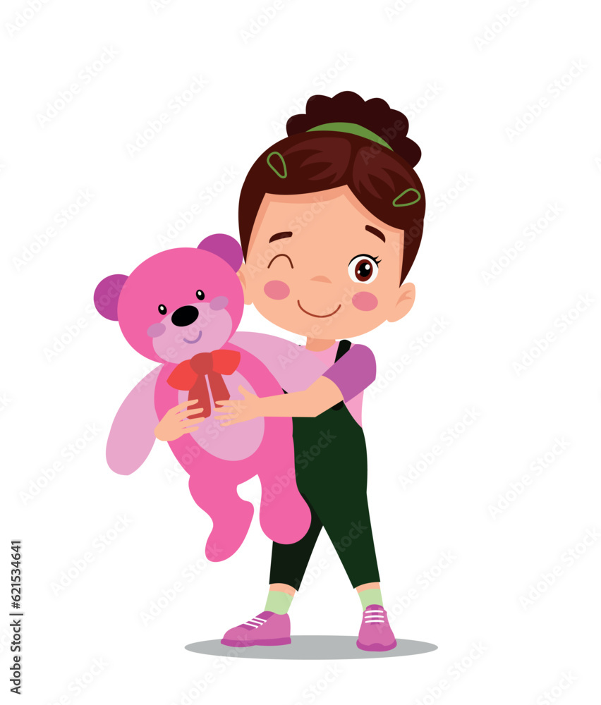 A boy is holding a teddy bear A boy is holding a teddy bear