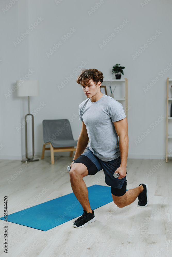 man activity lifestyle gray sport dumbbells health training mat indoor home man activity lifestyle gray sport dumbbells health training mat indoor home