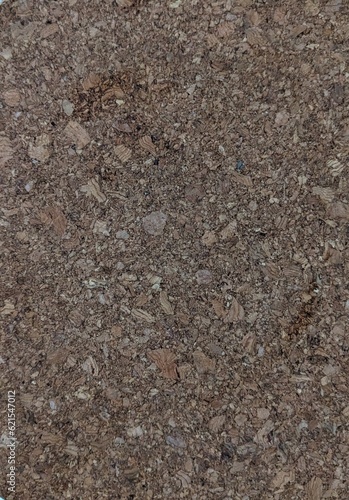 Photo of dark soil texture on the floor