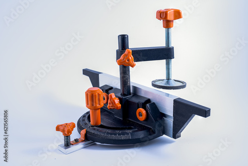 Table saw adjustable mitre gauge with attached clamp and aluminium rail