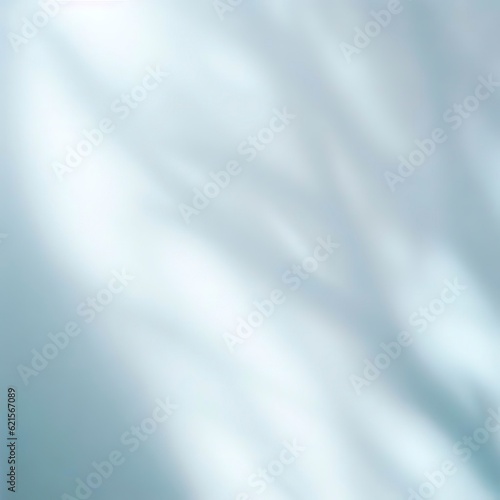 Minimalistic abstract gentle light blue background for product presentation with light and intricate shadow from tree branches on wall