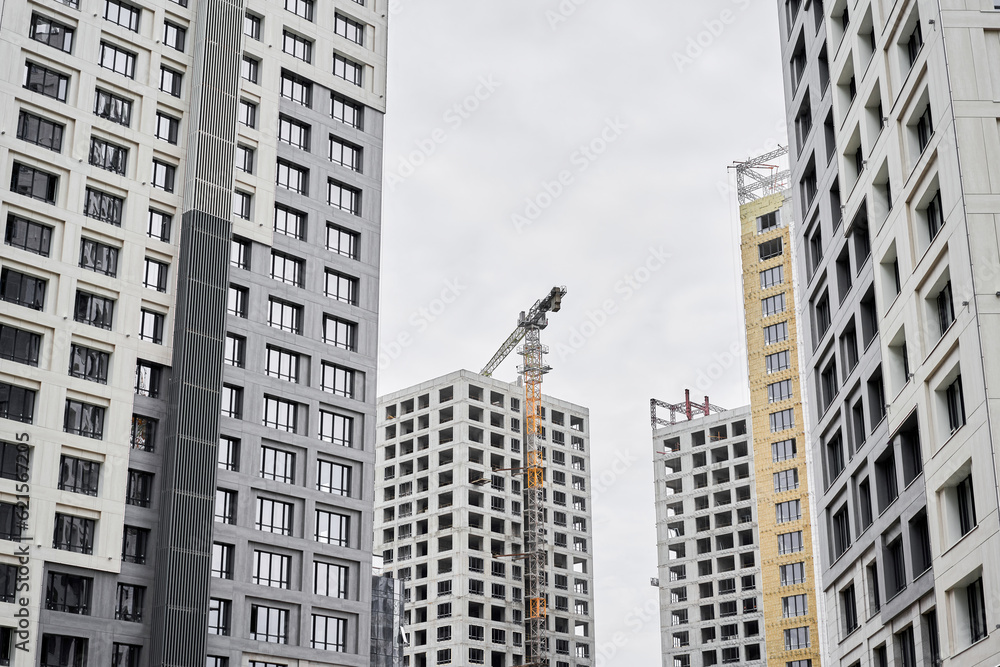 View of a large construction site with buildings under construction and ...