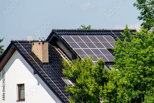 House roof with photovoltaic modules.