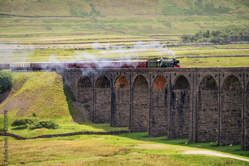 The Flying Scotsman Steam Train crossing The Ribblehead Viaduct, Yorkshire Dales, UK. photo
