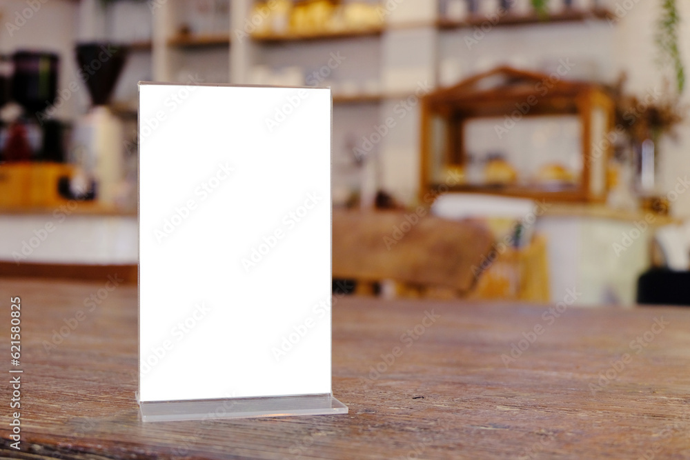 Mock up Menu frame standing on wood table in Bar restaurant cafe. space for text Mock up Menu frame standing on wood table in Bar restaurant cafe. space for text
