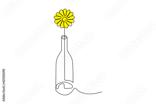 continuous line vector illustration of a flower in a bottle