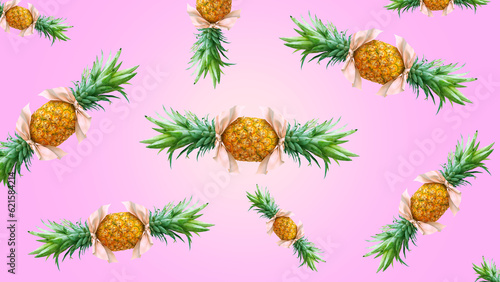 Bonbon candies made of pineapple fruit with pink bows on pastel pink background. Original summer design. Minimal fruit concept. Creative advertisement idea. Fruit candy. Pineapple bonbon. 