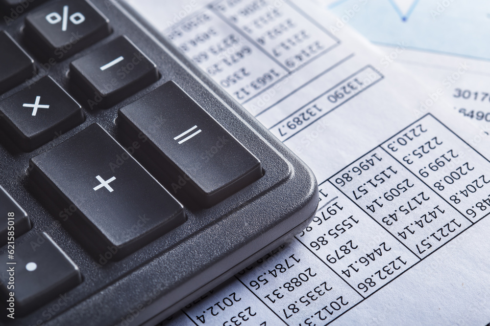 calculator and financial charts. Investment and capital accumulation concept calculator and financial charts. Investment and capital accumulation concept