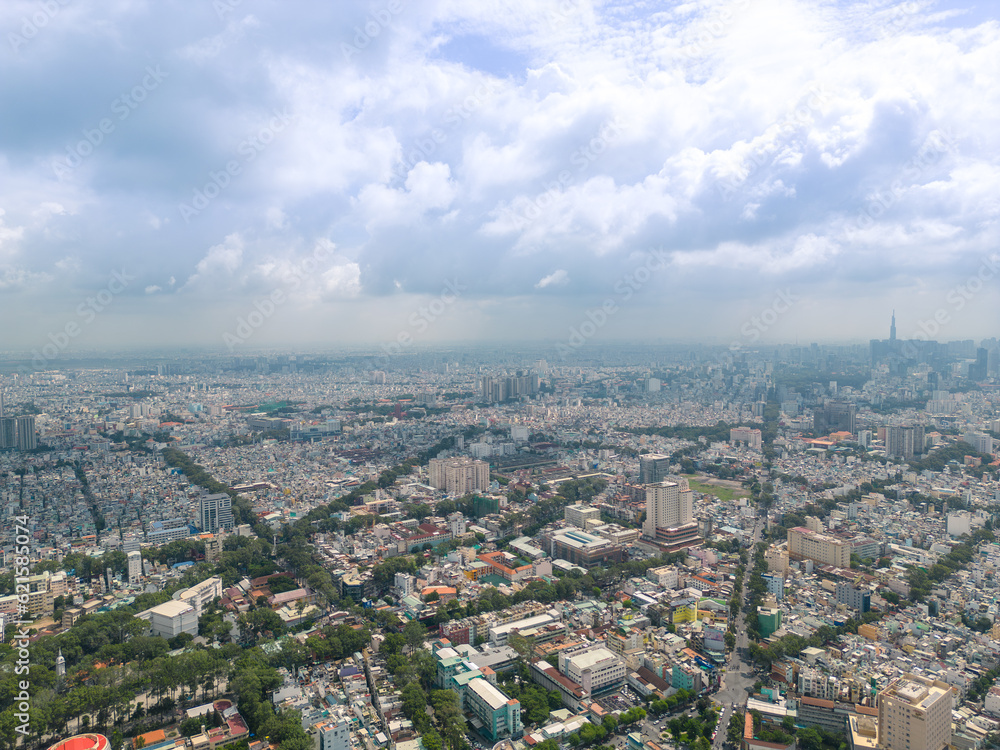 Aerial view of Ho Chi Minh City skyline and skyscrapers in center of heart business at Ho Chi Minh City downtown. Cityscape and many buildings, local houses