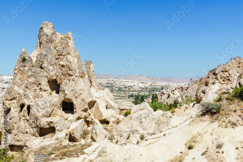 Rock formations, cave houses in Goreme open air museum in Nevsehir, Cappadocia, Turkey.