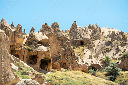 Cave town and rock formations in Zelve Valley, Cappadocia, Turkey photo