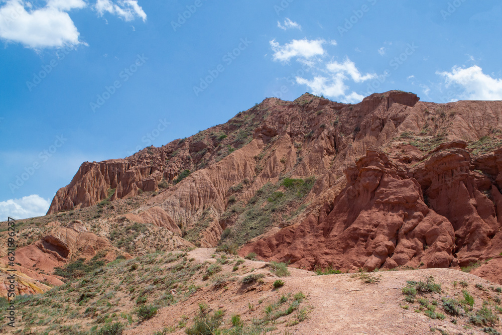 Chalk mountains in Skazka valley in Kyrgyzstan and rocks Chalk mountains in Skazka valley in Kyrgyzstan and rocks