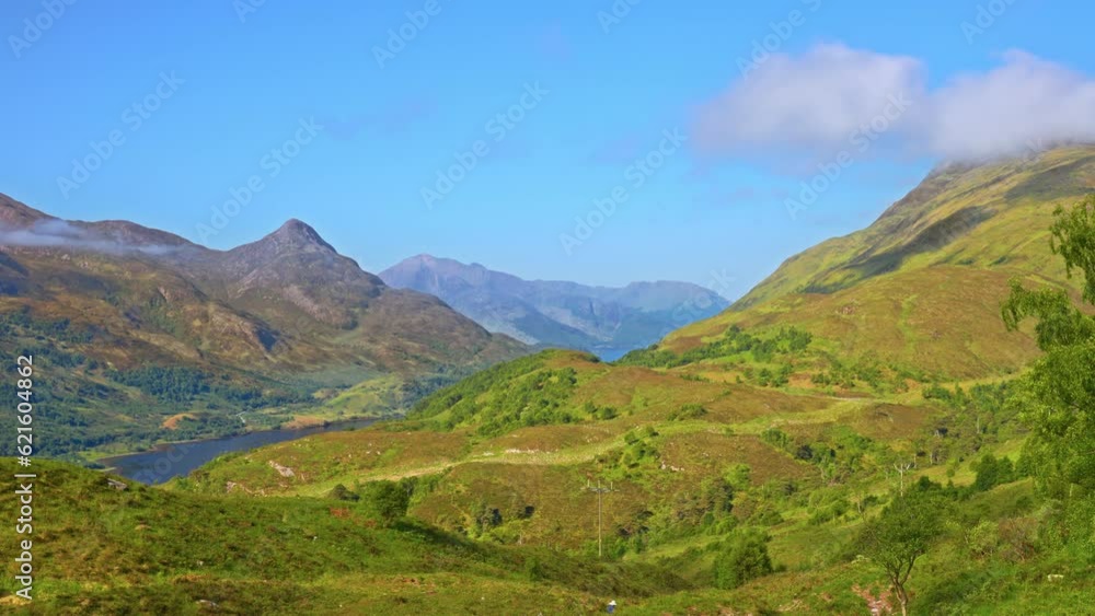 Mountainous Scottish highland wilderness landscape in the early morning of a sunny summer along the West Highland Way, Scotland Mountainous Scottish highland wilderness landscape in the early morning of a sunny summer along the West Highland Way, Scotland
