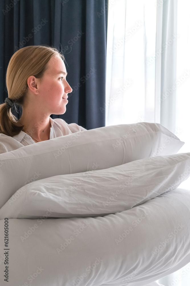 girl cleans the bedroom. Makes the bed after sleep. House cleaning, daily cleaning concept, cleaning service girl cleans the bedroom. Makes the bed after sleep. House cleaning, daily cleaning concept, cleaning service