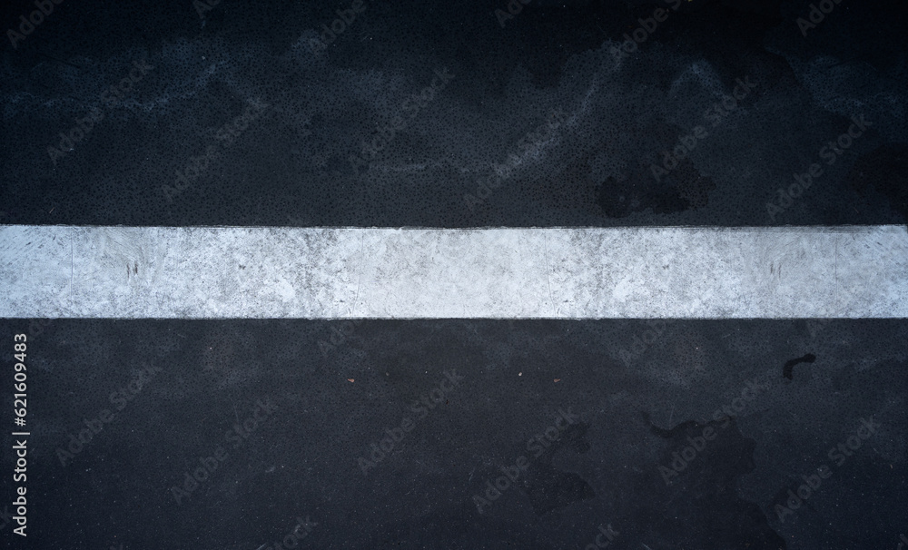 Fototapeta premium concrete or asphalt with white line, road marking, grunge background texture