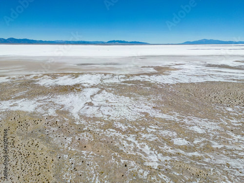 Aerial view of the huge salt flats Salinas Grandes de Jujuy in northern Argentina while traveling South America 