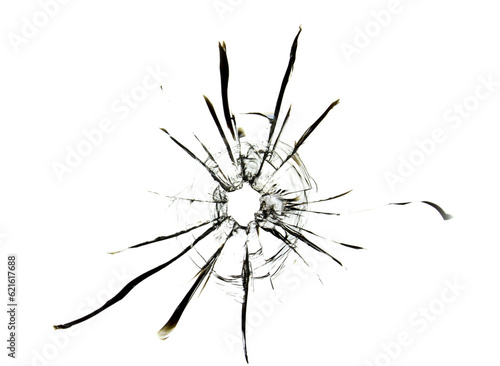 Texture of cracked glass with a hole from a bullet shot from a weapon. Isolated effect of a dish for design on a white background.
