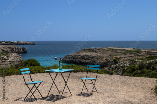 Terrace overlooking the bay of Binidali on the Spanish island of Menorca.
