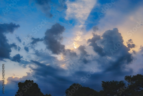 Cloudy sky background on the edge of a storm near sunset