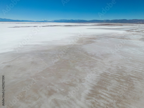 Aerial view of the huge salt flats Salinas Grandes de Jujuy in northern Argentina while traveling South America 