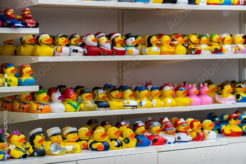 Fotografie Toy rubber ducks with different characterizations, on a store shelf