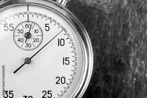 mechanical analog stopwatch on a colored background. Time part precision. Measurement of the speed interval