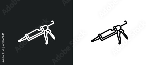 caulk gun outline icon in white and black colors. caulk gun flat vector icon from construction and tools collection for web, mobile apps and ui. photo