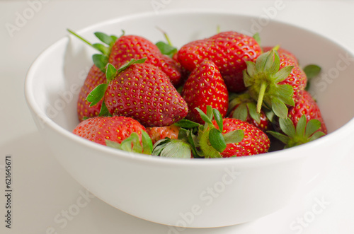 Fresh and juicy homemade strawberries close-up on the table, ready to be enjoyed.
