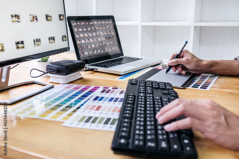 Image of male creative graphic designer working on color selecti Image of male creative graphic designer working on color selecti