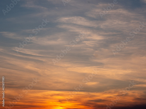 Amazing sunset sky. Warm and cool color. Calm and peaceful mood. Nature background for design or sky replacement. © mark_gusev