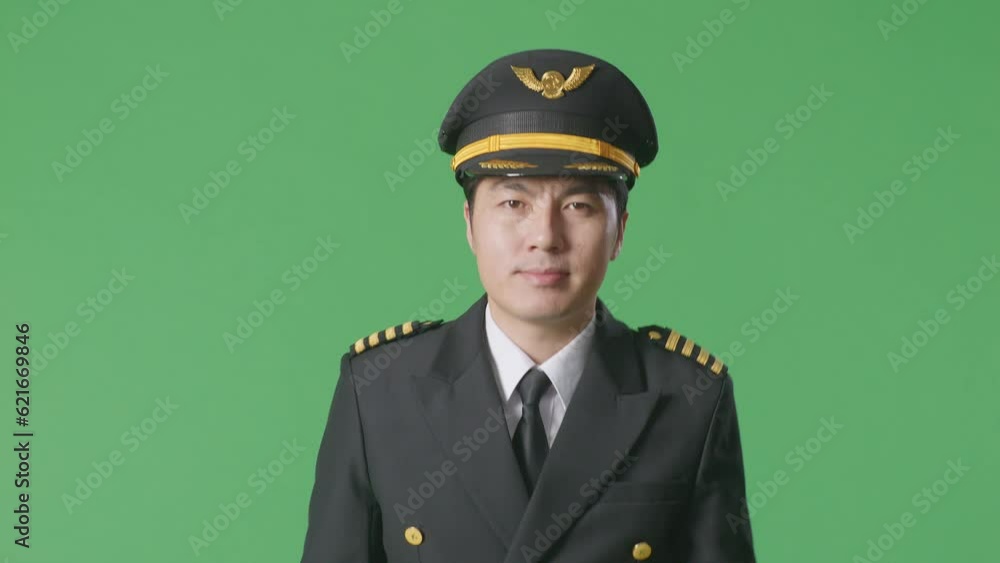 Asian Man Pilot Taking Note On A Tablet While Walking In The Green Screen Background Studio
Asian Man Pilot Taking Note On A Tablet While Walking In The Green Screen Background Studio