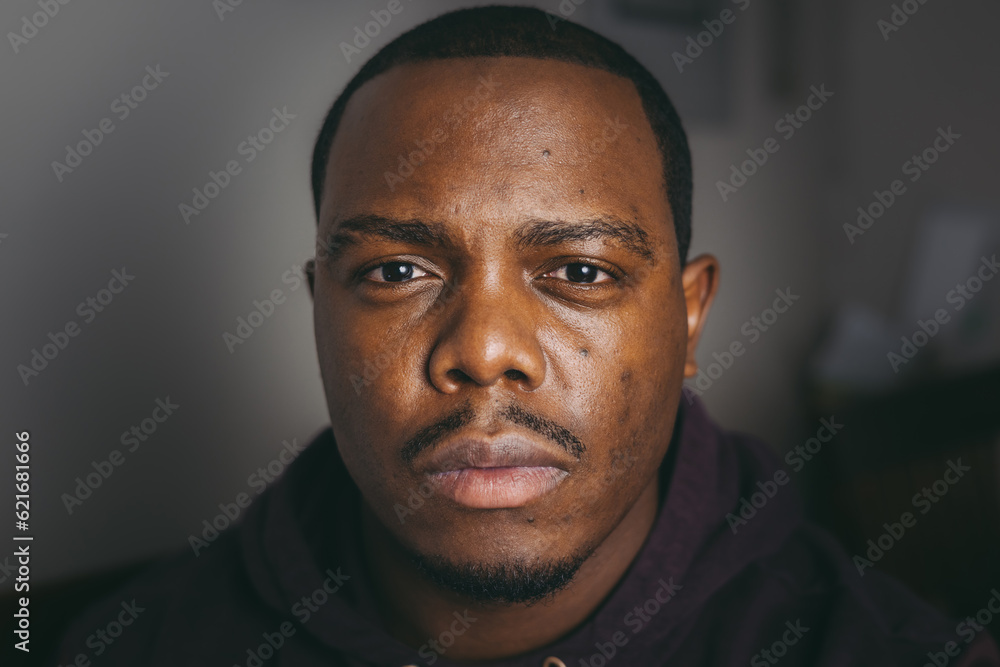 young african american man looking directly into camera young african american man looking directly into camera