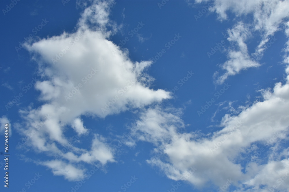 White clouds against blue sky for a backgrounds White clouds against blue sky for a backgrounds