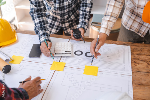 Factory Meeting Room of architect engineer meeting at working desk of blueprints construction concept. Engineer people concept