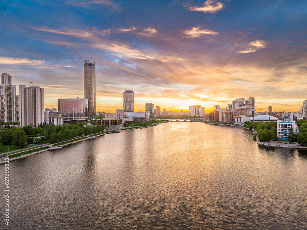 Yekaterinburg city with Buildings of Regional Government and Parliament, Dramatic Theatre, Iset Tower, Yeltsin Center, panoramic view at summer sunset.